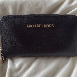 Michael Kors all leather Black Zip-Around Wallet in excellent condition